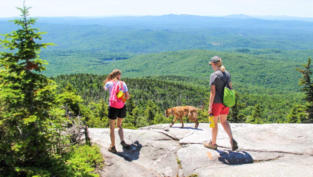 Two hikers in New Hampshire mountains