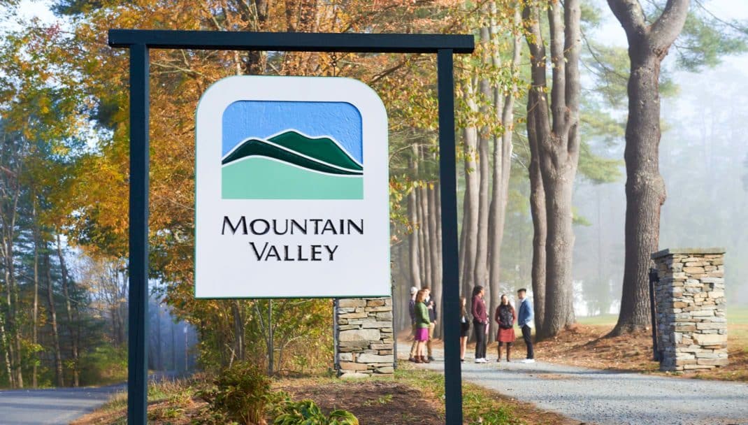 MVTC sign and students walking in the background