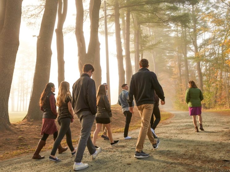 Students and staff going for a walk in the early morning